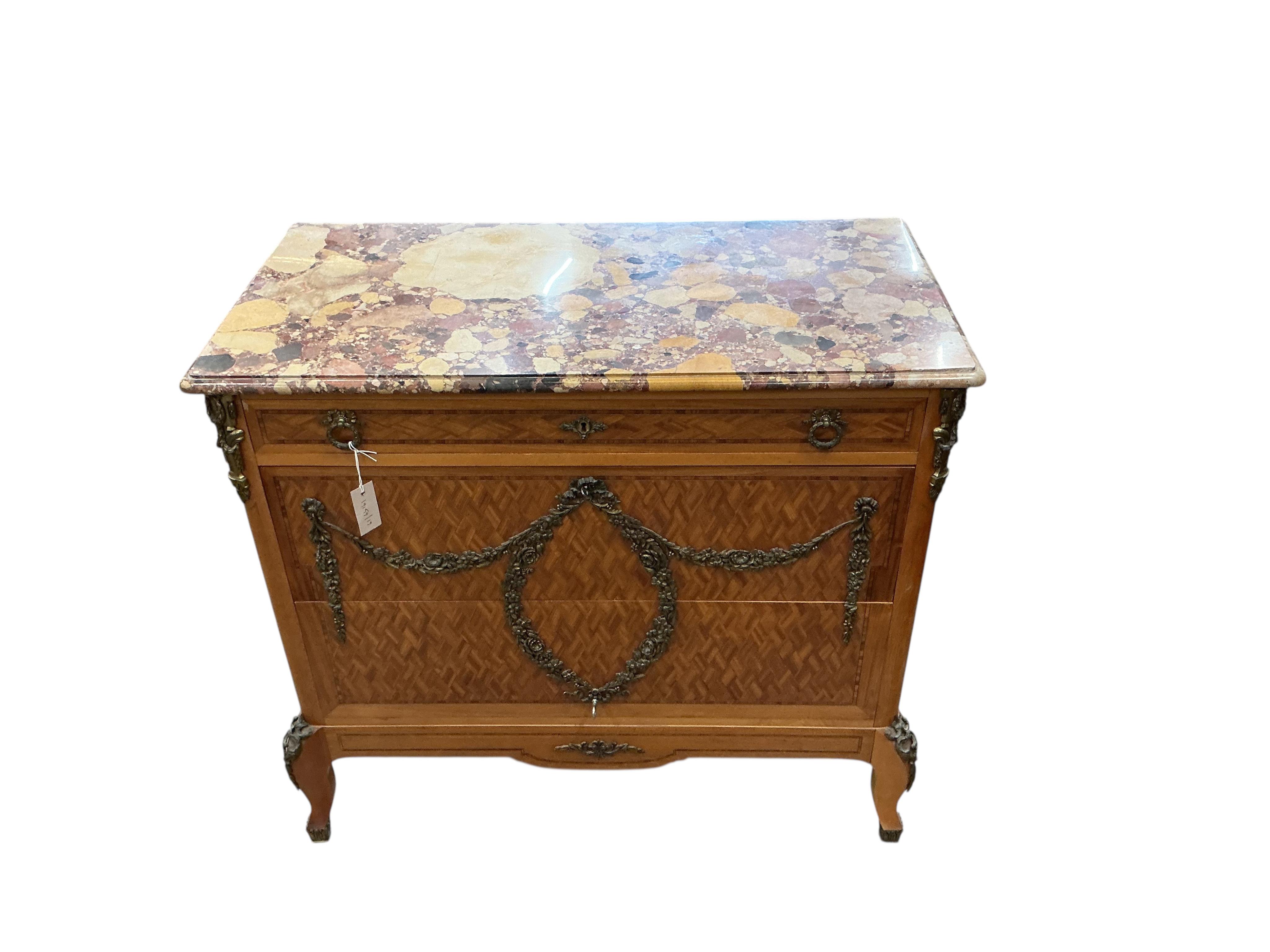 An early 20th century French transition style gilt metal mounted parquetry inlaid marble topped chest, fitted slide, width 99cm, depth 50cm, height 91cm